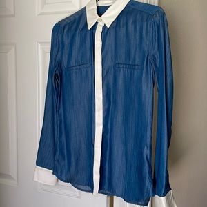 7 for all mankind button down denim shirt. White accents on cuff, collar & butto